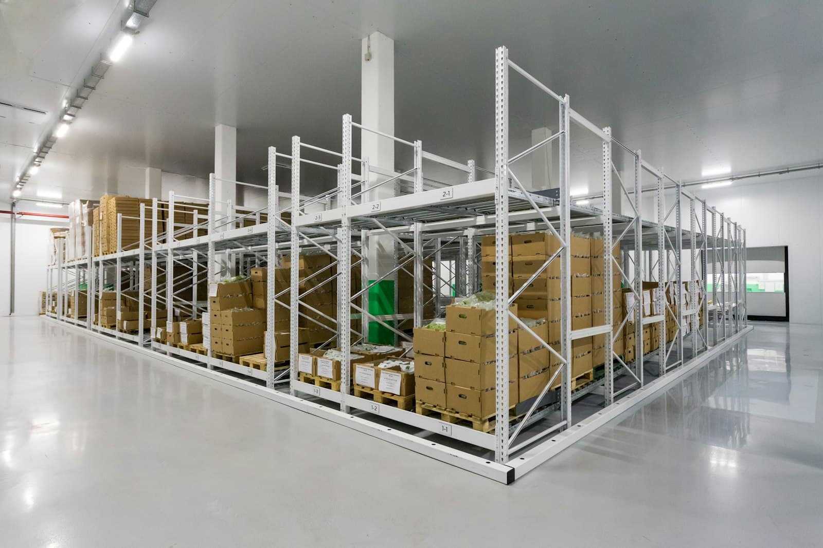Clean indoor storage with shelving and stacked boxes